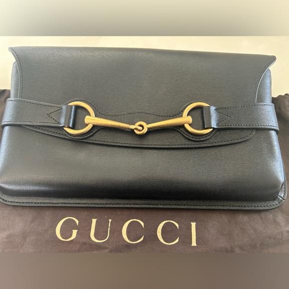 Gucci Black Leather clutch in excellent used condition - Picture 1 of 10